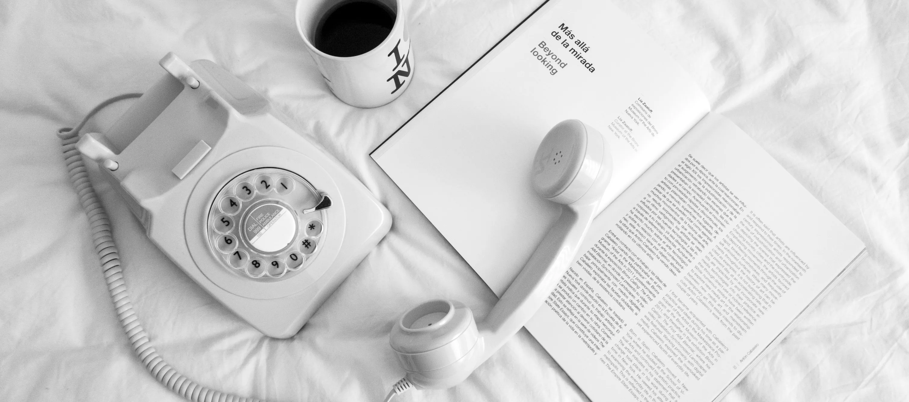 A white rotatry telephone